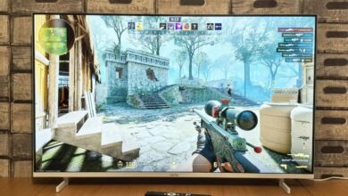 Television screen displaying a first-person shooter video game.
