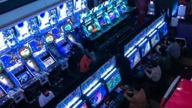 a group of people playing video games inside of a building