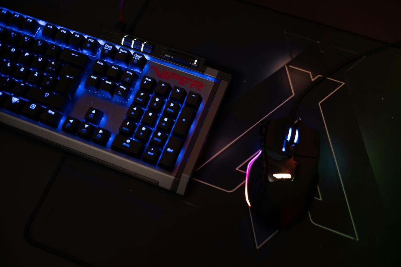 a close up of a keyboard and a mouse