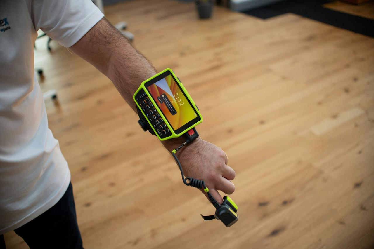 Person wearing a wearable device on arm